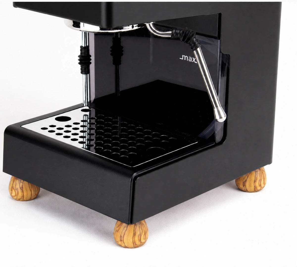 A black espresso machine with a glossy finish, featuring a stainless steel drip tray, a chrome steam wand, and small round wooden feet, shown on a white background.