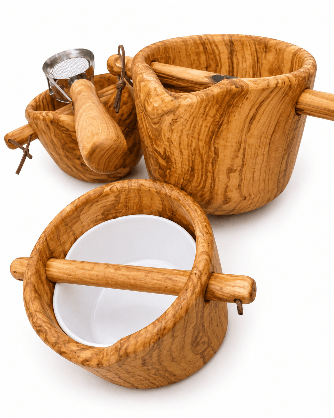 Handcrafted olive wood coffee accessory set with ceramic bowl and stainless steel portafilter on white background